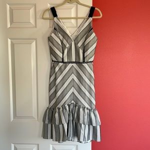 Black and white chevron dress with with ruffle hem size S
